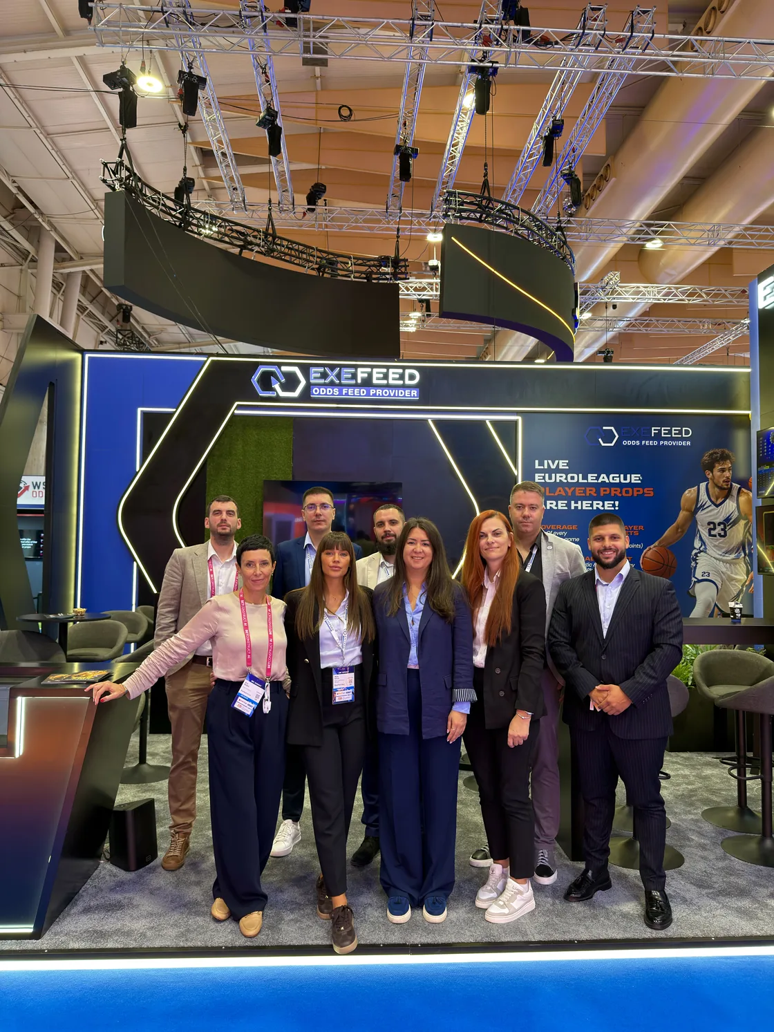 A group photographed together at the stand in Lisbon